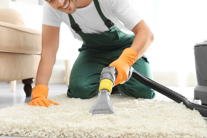 Happy homeowner with freshly cleaned carpets